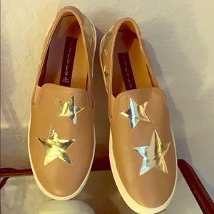 Gold star with tan leather Steve Madden shoes